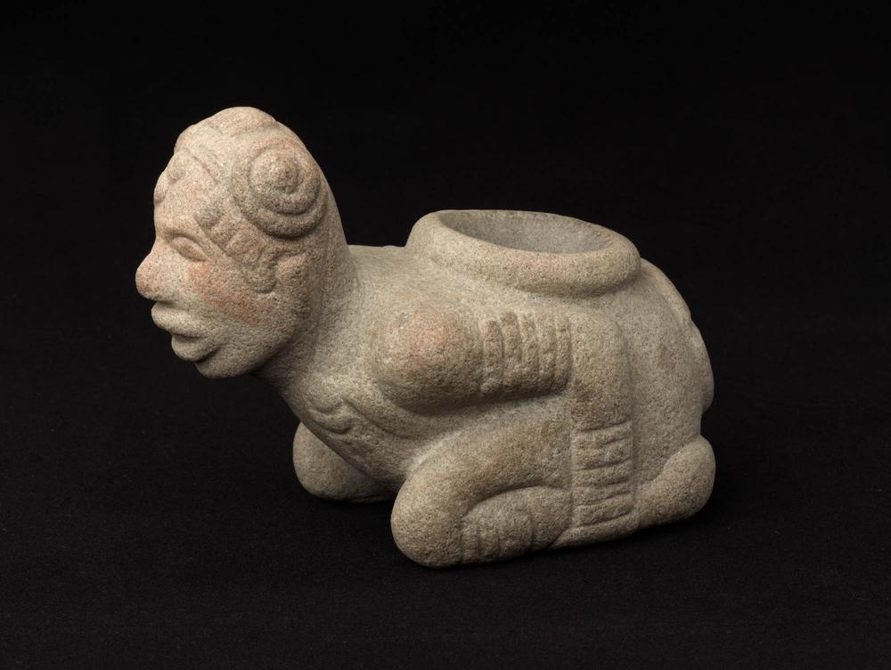 Kneeling figure effigy pipe